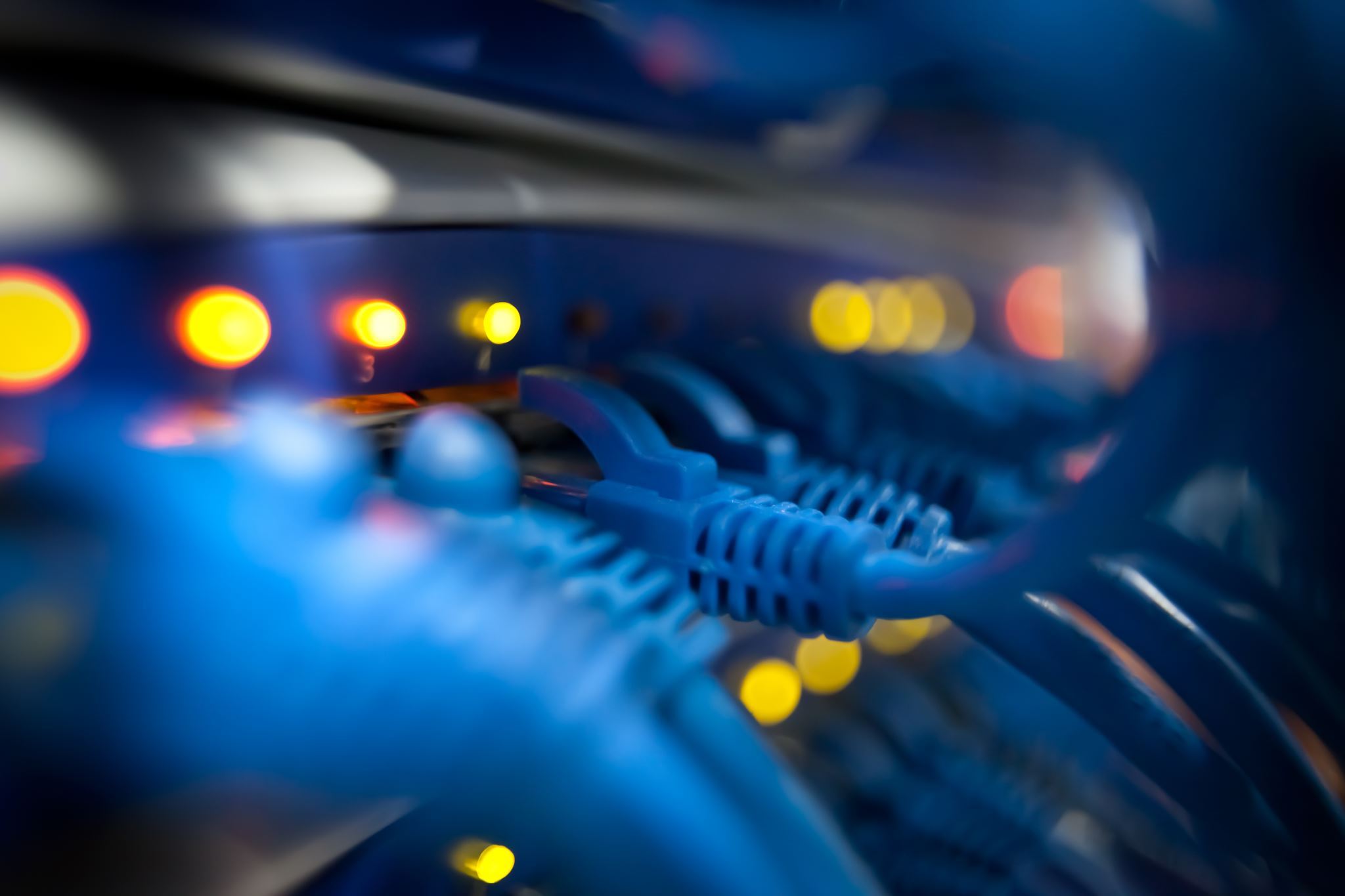 Close-up-of-a-server-network-panel-with-lights-and-cables